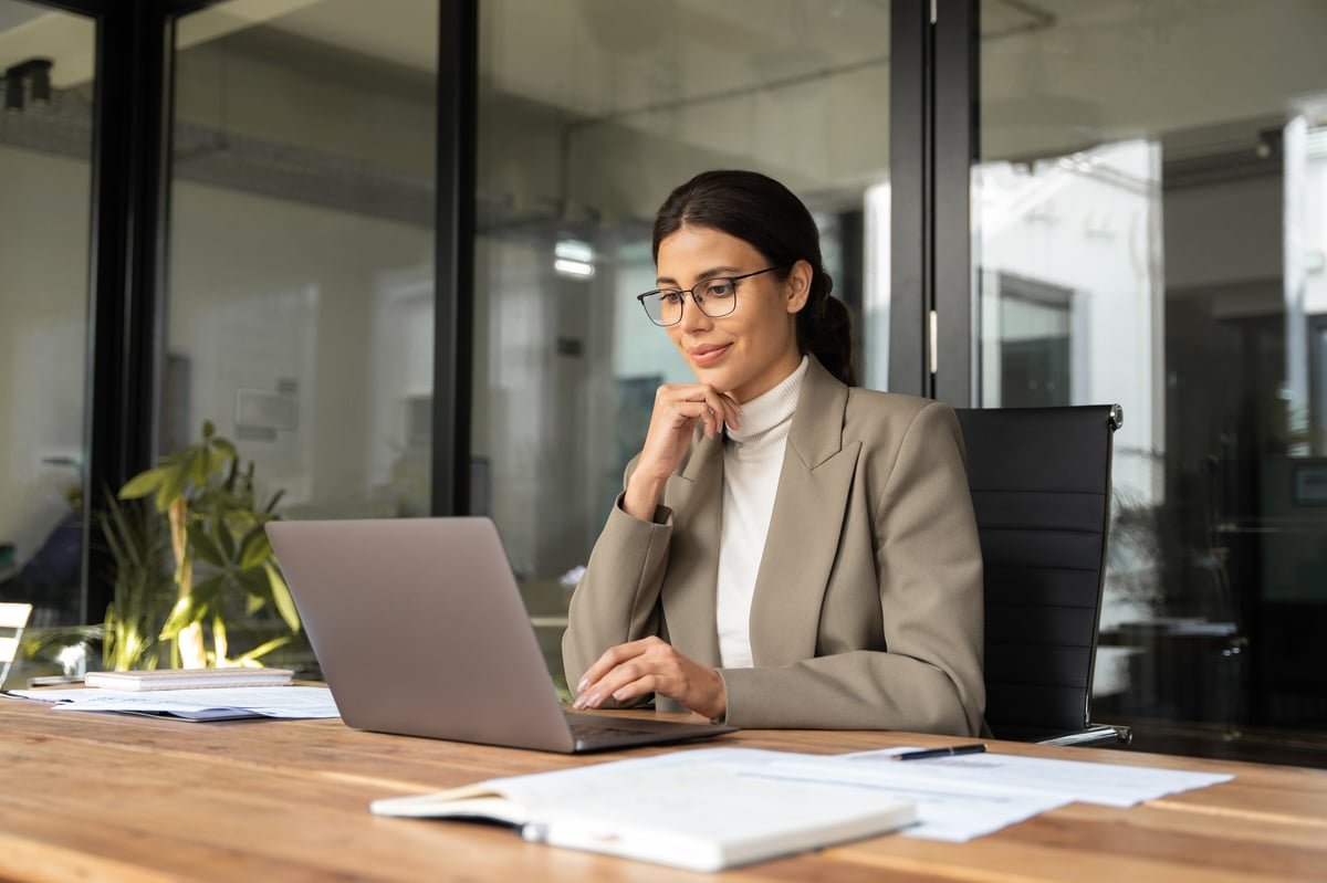 Professional woman working on laptop