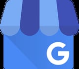 Google Shopping app icon featuring a blue storefront with striped awning and white G logo